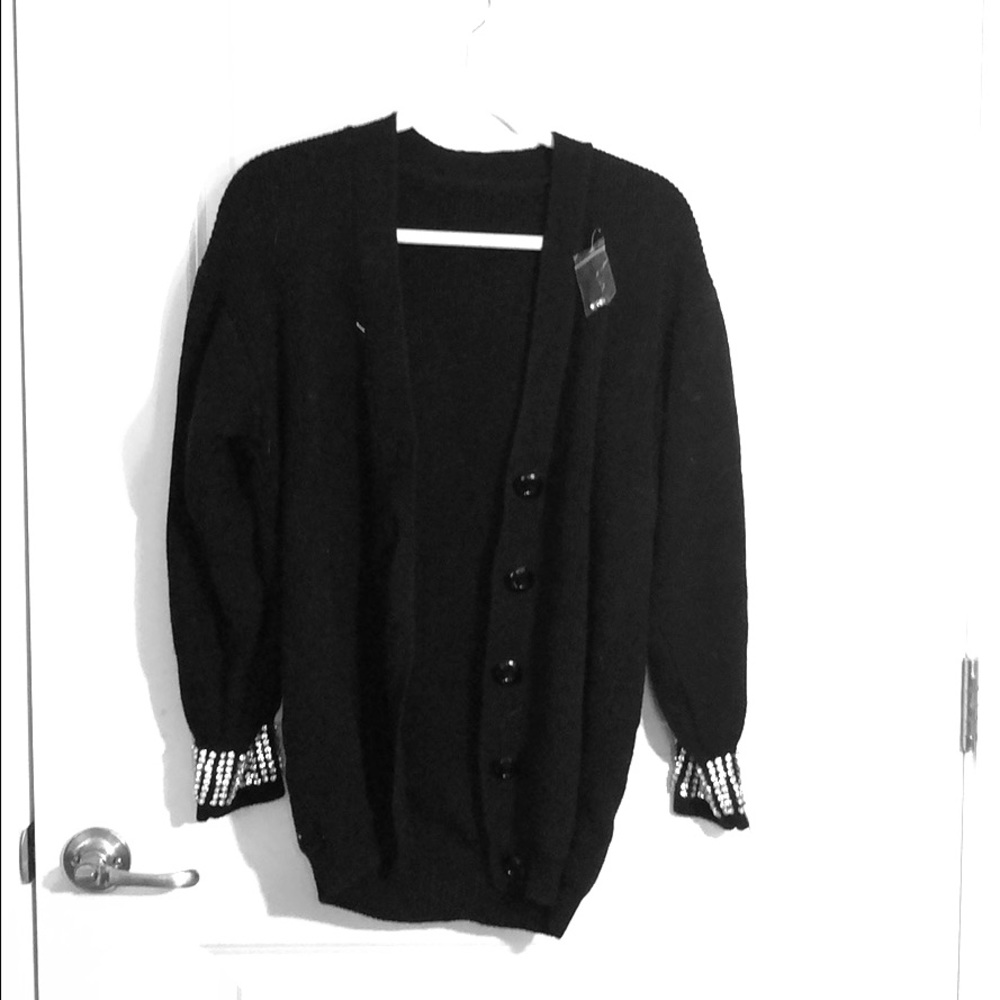 Long cardigan with diamond sleeves’ ends